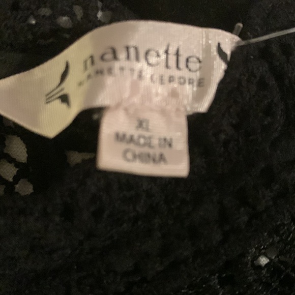 Exquisite black, lace blouse over a black camisole. - Picture 4 of 6